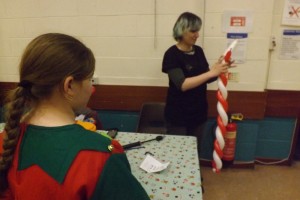 Watching the balloon maker, who did a wonderful job with so many balloons.